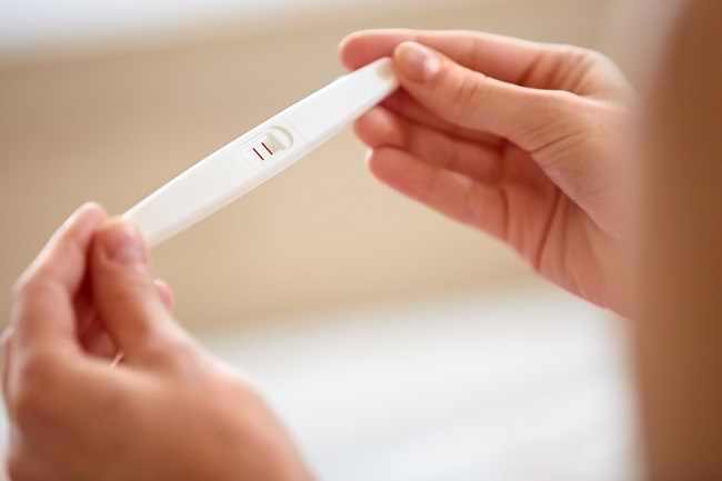 Mengenai Ujian Kehamilan dengan Pek Ujian